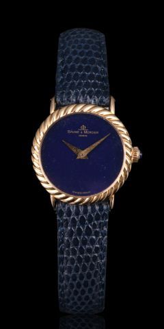 BAUME MERCIER

Lady's watch in yellow gold...