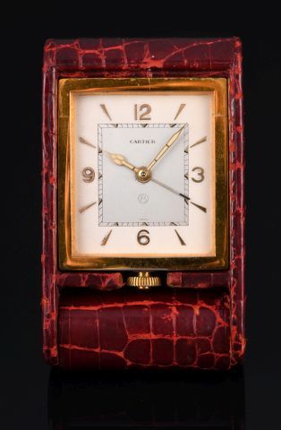 CARTIER

Réveil de bureau en métal doré et...