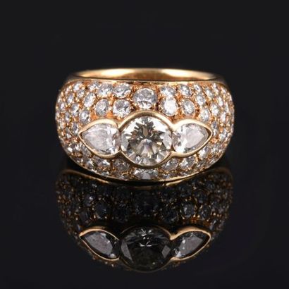 18k yellow gold ring set with a large pavement...