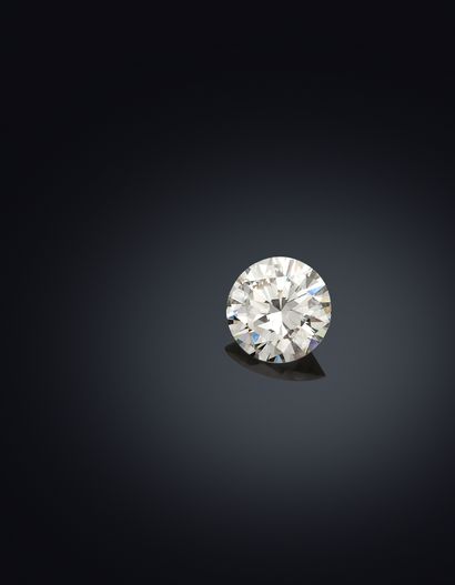 Solitaire en or blanc 18K 750 millièmes et...