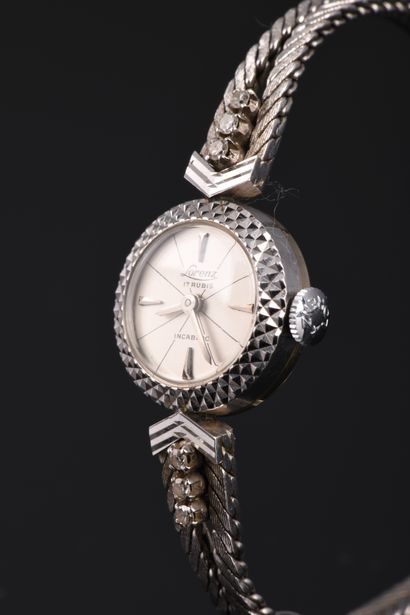 LORENZ

Montre de ville en or gris 18K 750...