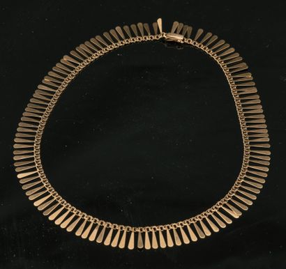 Collier moderniste en or jaune 18K 750 millièmes...