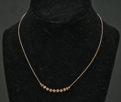 Collier en or jaune 18K 750 millièmes agrémenté...