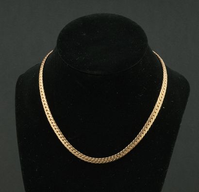 Collier souple années 1960 en or jaune 18k...