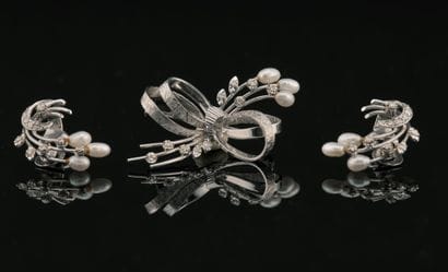 
Parure en or gris 18K 750 millièmes composée...