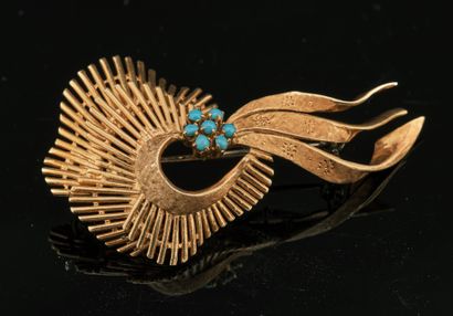 Broche en or jaune 18K 750 millièmes à décor...