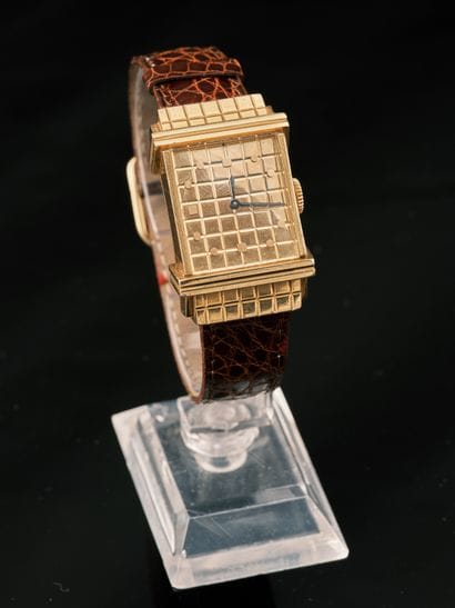 Montre de dame en or jaune 18K 750 millièmes...