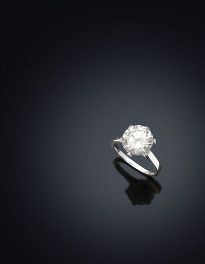 Solitaire en or blanc 18K 750 millièmes et...