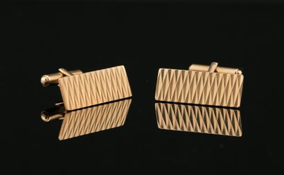 Paire de boutons de manchettes en or jaune...