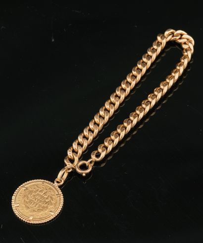 Bracelet en or jaune 18k orné d'une pièce...