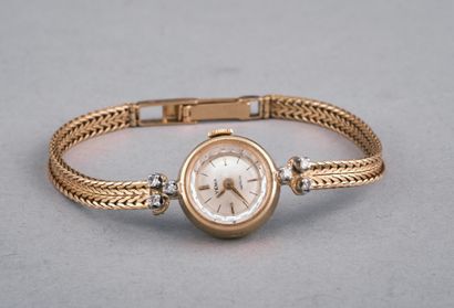 YEMA
Montre de dame en or jaune 18k 750 millièmes.
Boitier...