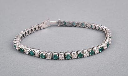 Bracelet tennis en or blanc 18k 750 millièmes...