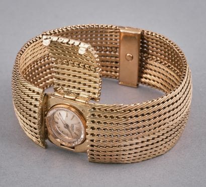 LONGINES, 
Bracelet manchette - montre en...