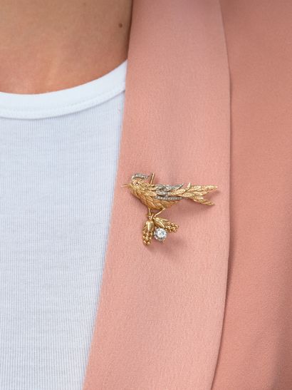 Broche en deux tons d'or jaune et gris 18k...