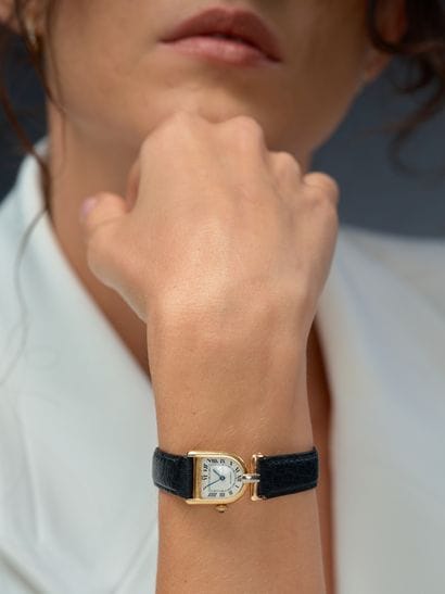CARTIER
Calandre ou étrier 
Rare montre de...