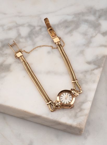 Montre de dame en or rose 18k 750 millièmes...