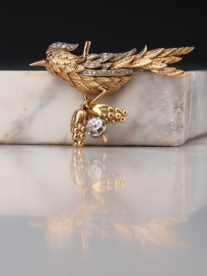 Broche en deux tons d'or jaune et gris 18k...