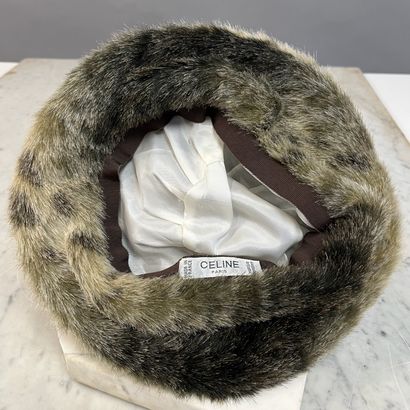 CELINE
Béret en fourrure synthétique imprimé...