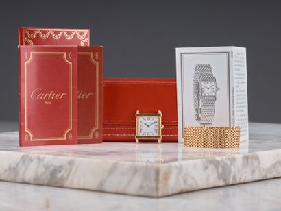 CARTIER
Tank chinoise
Rare montre mixte en...