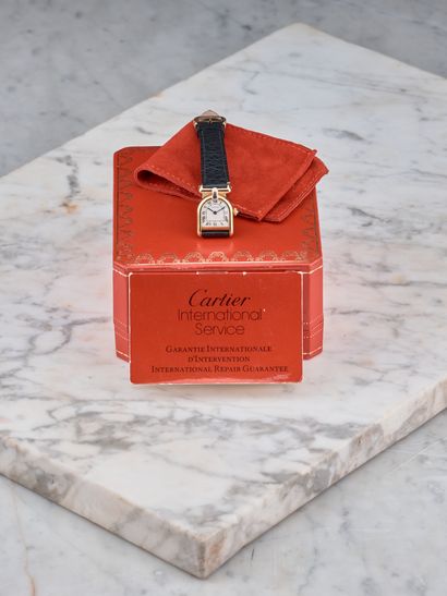 CARTIER
Calandre ou étrier 
Rare montre de...