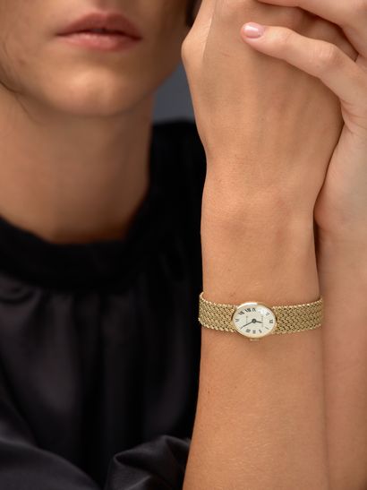 JEAN ÉTÉ 
Montre de dame en or jaune 18k...