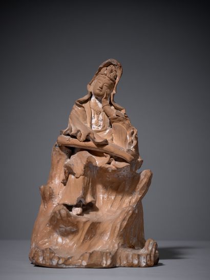CHINE, XXe siècle
Groupe en terre cuite figurant...