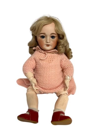 UNIS FRANCE
Poupée tête en porcelaine, yeux...