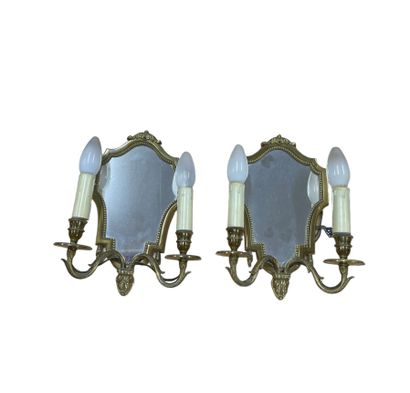 Paire de miroirs formant appliques à deux...