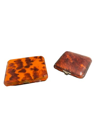Set of two tortoiseshell and metal compacts.
20th...