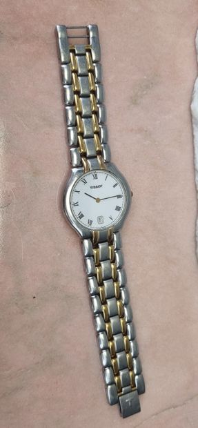 TISSOT
Mixed steel and gold-plated watch.
Oval...