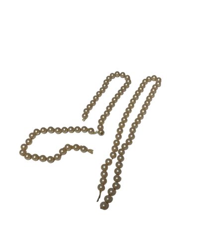 Set of cultured pearl necklace elements.
(Worn,...