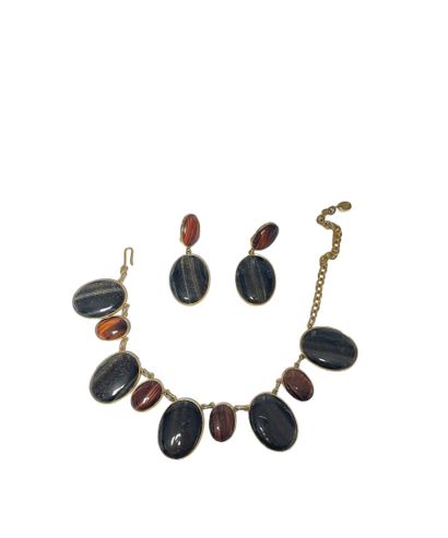 Attributed to CELINE
Half set in gilded metal...