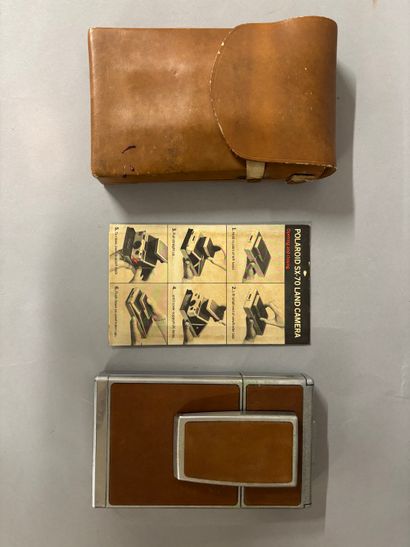 [CAMERA]
Vintage Polaroid SX70 with leather...
