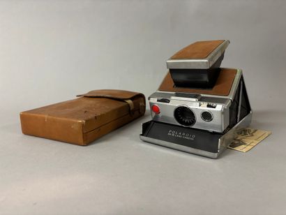 [CAMERA]
Vintage Polaroid SX70 with leather...