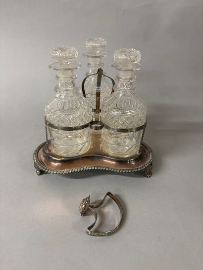Tripod silver-plated decanter holder decorated...