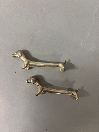 Suite of 12 silver-plated knife holders featuring...