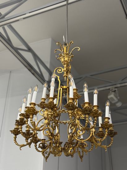 Important lustre en bronze doré de style...