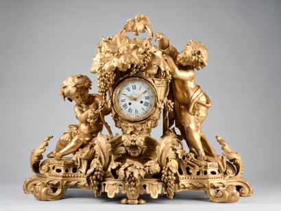 Importante pendule de cheminée en bronze...