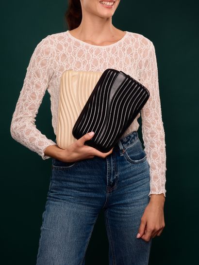 Emilio PUCCI
Lot de deux pochettes dont :...