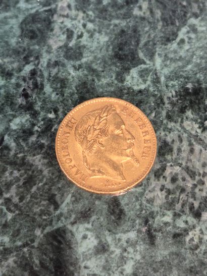 Une pièce de 20 francs en or, Napoléon III,...