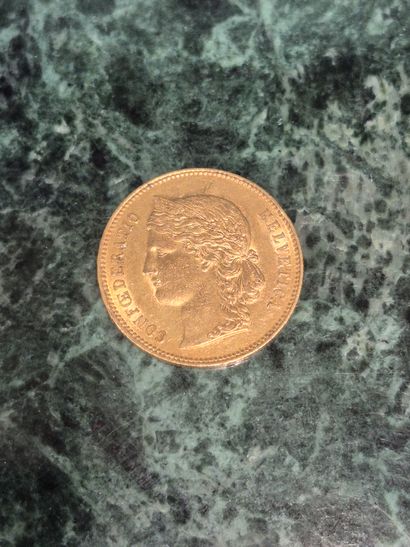 Une pièce de 20 Francs Suisse en or, datée...