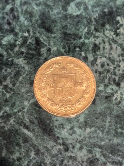 Une pièce de 20 Francs Suisse en or, datée...