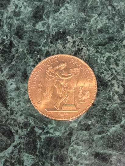 Pièce de 100 francs en or 1912, Génie gravant...