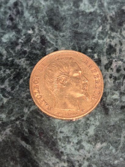 Une pièce de 20 francs en or, Napoléon III,...