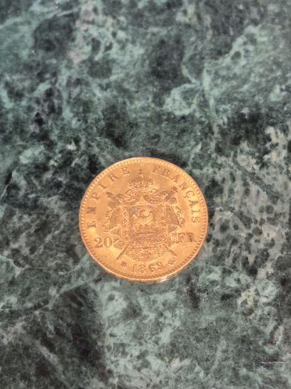 Une pièce de 20 francs en or, Napoléon III,...