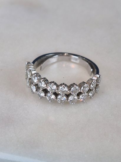 18k white gold ring set with two lines of...