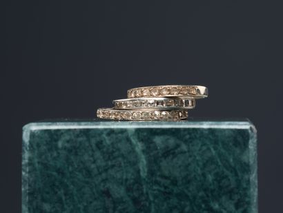 Three 18k gold and platinum wedding bands,...