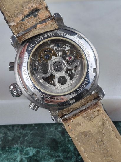 ANDRE BELFORT.
Metal skeleton dress watch...