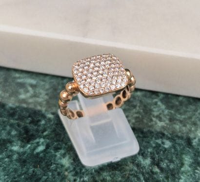18k 750 thousandth rose gold ring with rectangular...