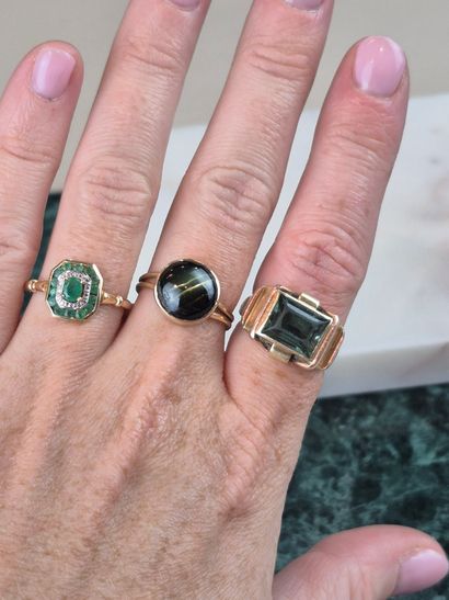 Meeting of 3 gold rings including : 
- 1...